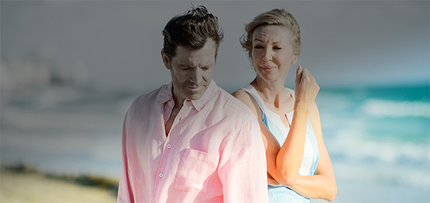 Picture of frustrated couple, back to back, who are in crisis